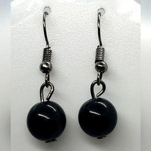 Woman black beaded earrings